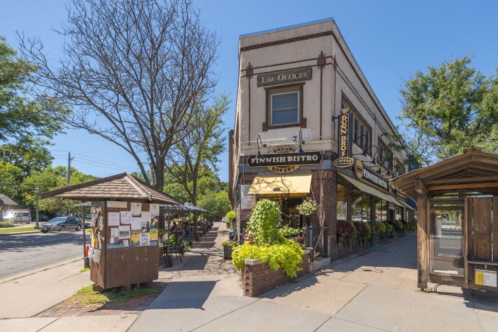 Storefront building in the Como Park neighborhood, featuring charming architecture, vibrant signage, and a welcoming community atmosphere.